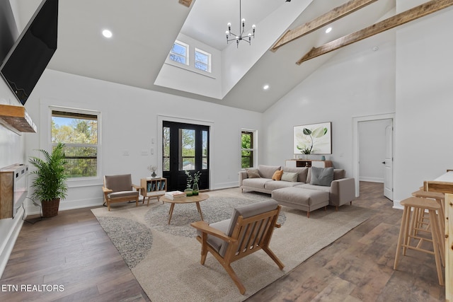 living room with high vaulted ceiling, recessed lighting, beam ceiling, and a chandelier