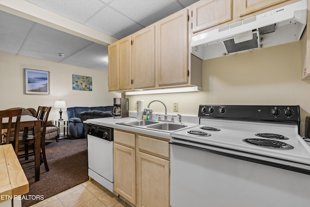 kitchen with white dishwasher, a sink, light brown cabinetry, range with electric stovetop, and under cabinet range hood