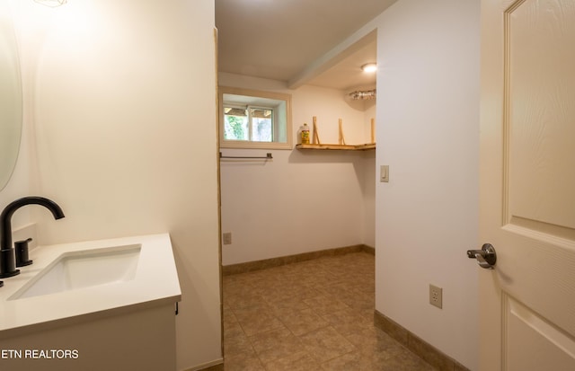 537 Wilson St, Newport, TN 37821 - bathroom with vanity, tile patterned floors, and baseboards