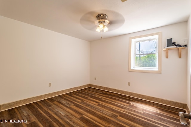 537 Wilson St, Newport, TN 37821 - spare room with ceiling fan, baseboards, and dark wood-style flooring