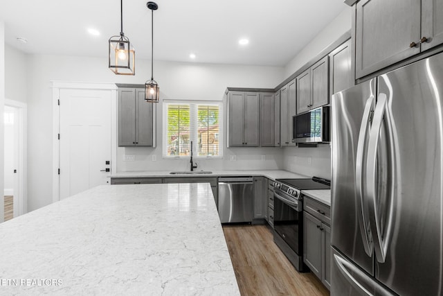 103 E Main St, Englewood, TN 37329 - kitchen with decorative light fixtures, a sink, recessed lighting, stainless steel appliances, and gray cabinets