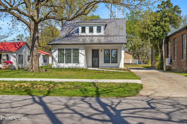 103 E Main St, Englewood, TN 37329 - bungalow-style house with a front yard and driveway