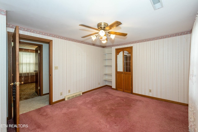 285 Telford St, Alcoa, TN 37701 - unfurnished bedroom featuring wallpapered walls, carpet flooring, baseboards, and visible vents