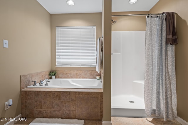 7300 Slippery Rock Ln, Knoxville, TN 37931 - bathroom with a garden tub, recessed lighting, and a shower with shower curtain