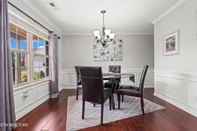 7300 Slippery Rock Ln, Knoxville, TN 37931 - dining space featuring a notable chandelier, crown molding, dark wood-style floors, and visible vents
