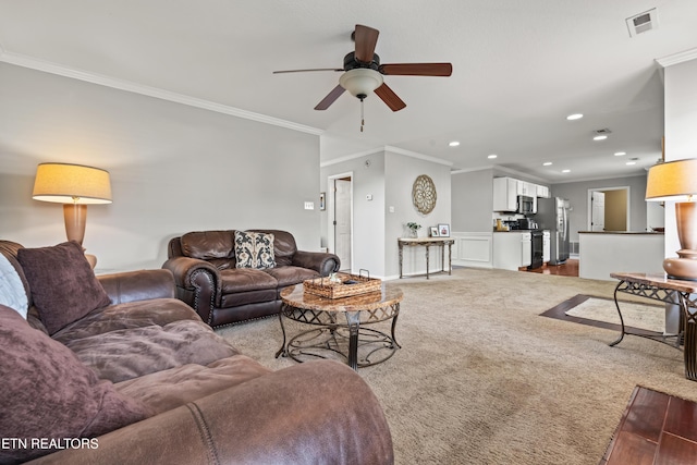 7300 Slippery Rock Ln, Knoxville, TN 37931 - carpeted living room featuring a ceiling fan, visible vents, recessed lighting, and crown molding