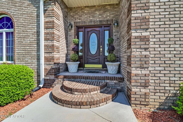 300 Lowe Rd, Huntsville, TN 37756 - property entrance featuring brick siding
