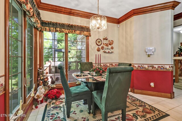 300 Lowe Rd, Huntsville, TN 37756 - tiled dining room with crown molding, baseboards, and a chandelier