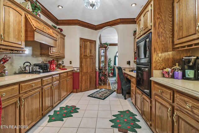 300 Lowe Rd, Huntsville, TN 37756 - kitchen with brown cabinetry, light countertops, and backsplash
