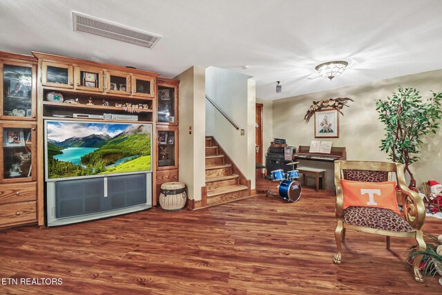 300 Lowe Rd, Huntsville, TN 37756 - living area featuring visible vents, wood finished floors, and stairway