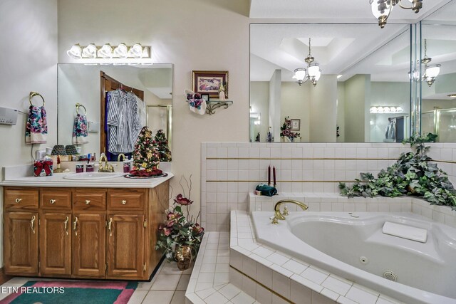 300 Lowe Rd, Huntsville, TN 37756 - bathroom featuring a whirlpool tub, a shower with shower door, tile patterned floors, and vanity