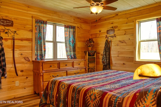 2025 Allardt Tinch Rd, Jamestown, TN 38556 - bedroom with wooden walls and a ceiling fan