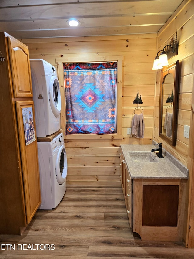 2025 Allardt Tinch Rd, Jamestown, TN 38556 - clothes washing area with stacked washer and clothes dryer, wood finished floors, wood walls, and recessed lighting