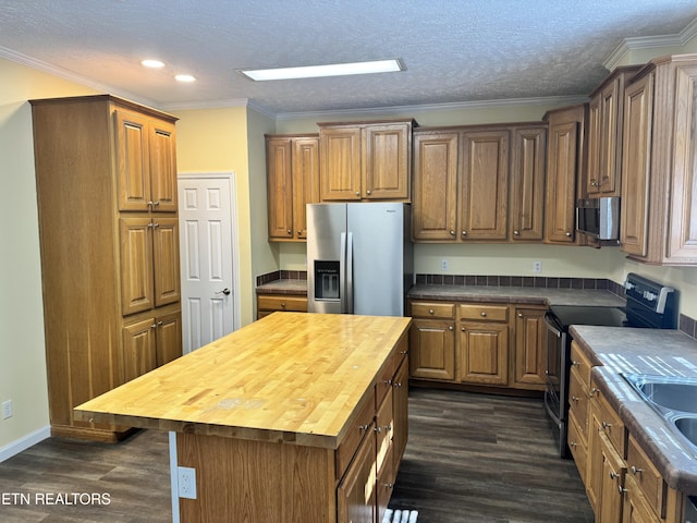 337 Costner Rd, Cosby, TN 37722 - kitchen featuring dark wood-style flooring, recessed lighting, wood counters, and stainless steel appliances