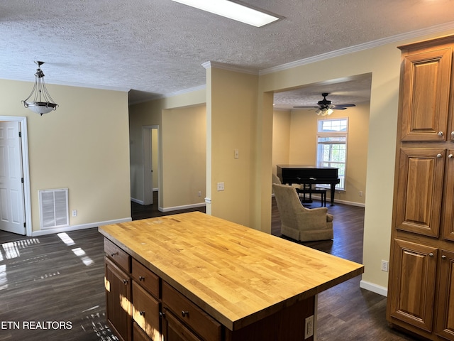 337 Costner Rd, Cosby, TN 37722 - kitchen featuring visible vents, baseboards, a textured ceiling, wood counters, and dark wood-type flooring