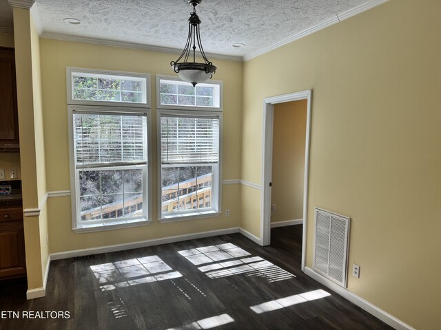 337 Costner Rd, Cosby, TN 37722 - unfurnished dining area with crown molding, visible vents, baseboards, and dark wood finished floors