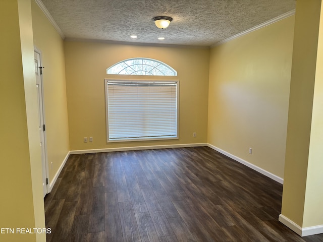 337 Costner Rd, Cosby, TN 37722 - empty room featuring ornamental molding, baseboards, a textured ceiling, and dark wood-style floors