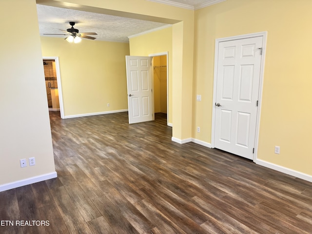 337 Costner Rd, Cosby, TN 37722 - unfurnished room featuring crown molding, dark wood-type flooring, a textured ceiling, a ceiling fan, and baseboards