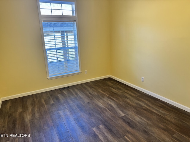 337 Costner Rd, Cosby, TN 37722 - unfurnished room featuring baseboards, dark wood finished floors, and visible vents