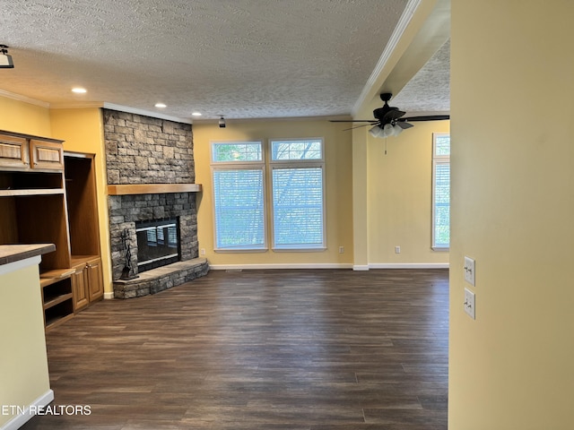 337 Costner Rd, Cosby, TN 37722 - unfurnished living room featuring plenty of natural light, a textured ceiling, and crown molding