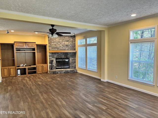 337 Costner Rd, Cosby, TN 37722 - unfurnished living room featuring dark wood finished floors, ceiling fan, plenty of natural light, and a textured ceiling