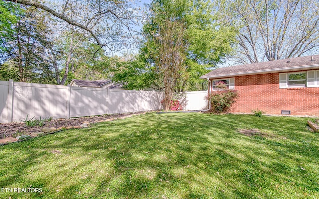 view of yard with fence