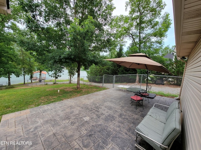 view of patio featuring outdoor dining space and a fenced backyard