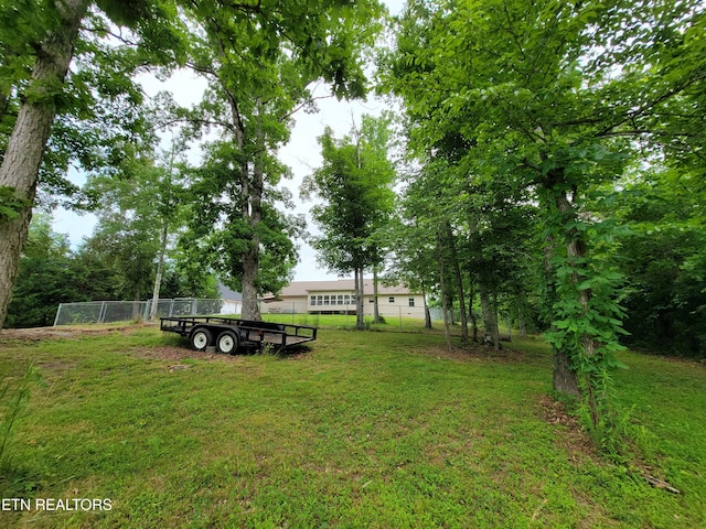view of yard with fence