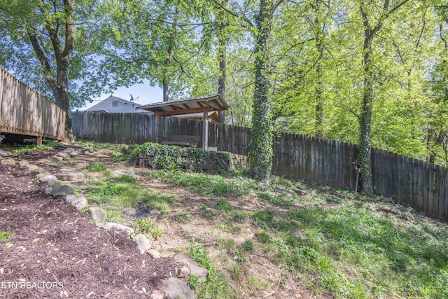 view of yard with a fenced backyard