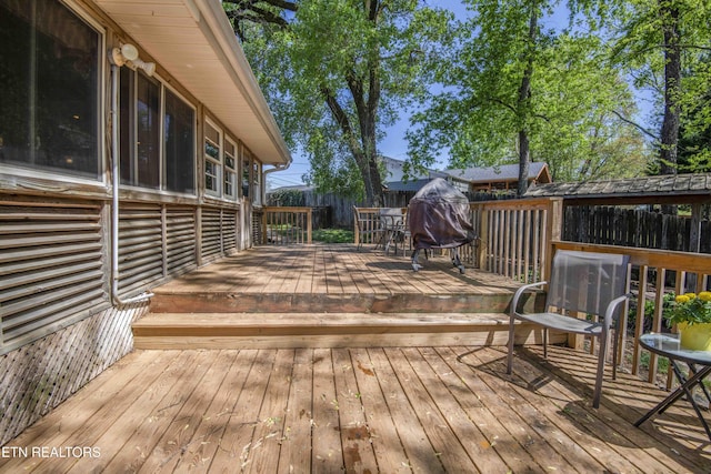 wooden terrace with fence