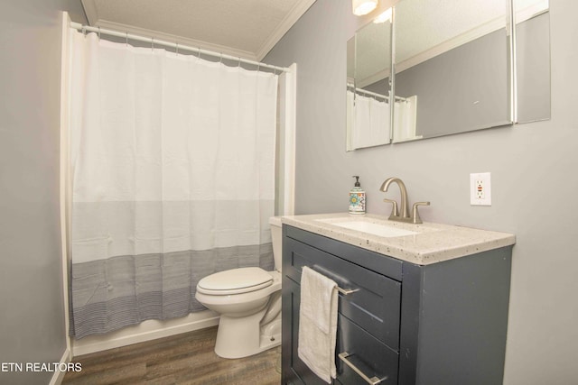 full bath with crown molding, toilet, vanity, and wood finished floors