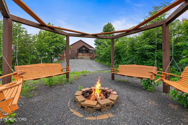 3219 Grouse Ridge Ln, Sevierville, TN 37862 - view of patio / terrace with a fire pit