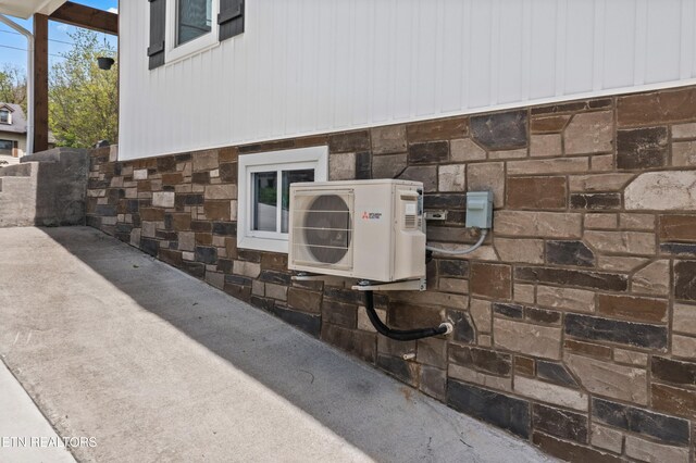 613 N St, Newport, TN 37821 - details with ac unit and stone siding
