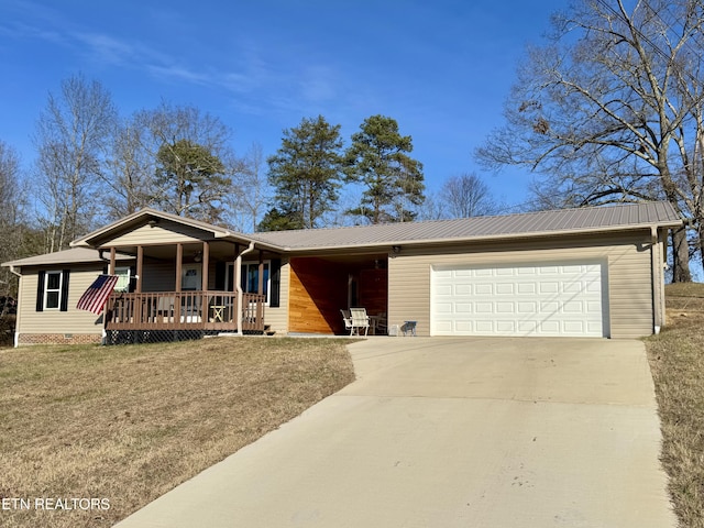 155 Oak Tree Ln, Sneedville, TN 37869 - ranch-style house with a front lawn, driveway, covered porch, an attached garage, and metal roof