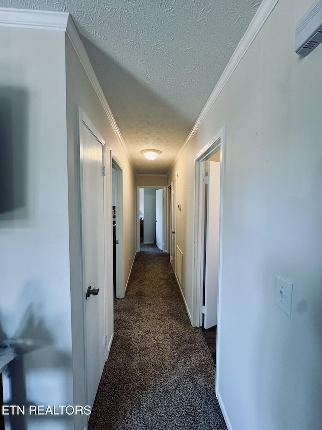 155 Oak Tree Ln, Sneedville, TN 37869 - hall with baseboards, crown molding, dark colored carpet, and a textured ceiling