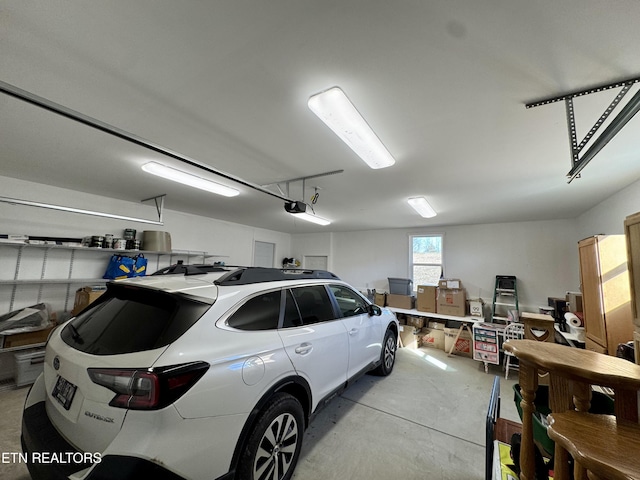 155 Oak Tree Ln, Sneedville, TN 37869 - garage featuring a garage door opener