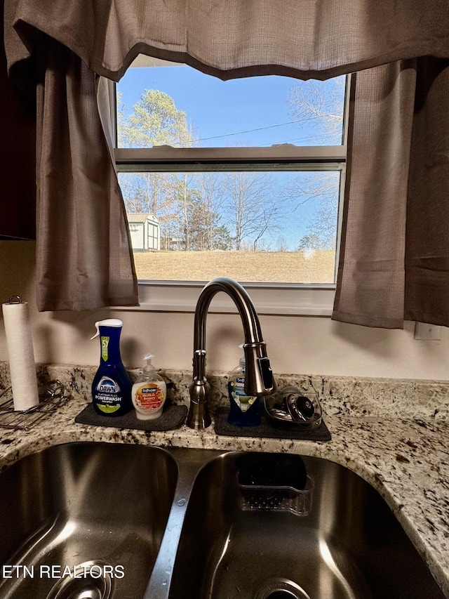 155 Oak Tree Ln, Sneedville, TN 37869 - interior details featuring light stone countertops and a sink