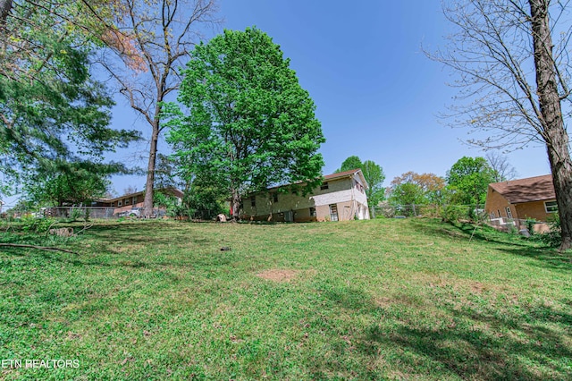 view of yard with fence