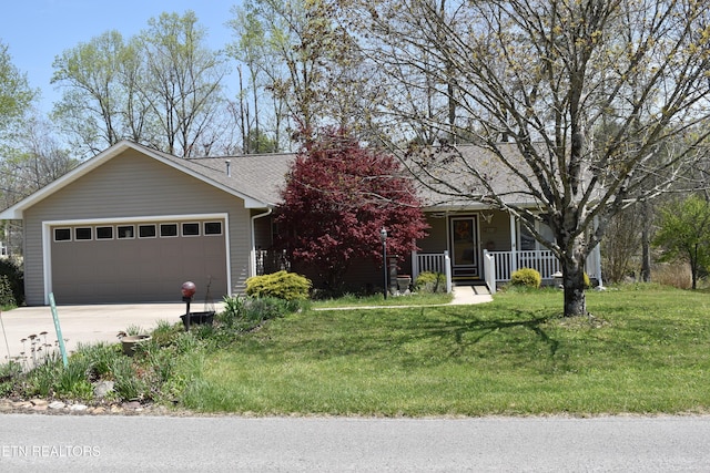 332 Yonside Dr, Sparta, TN 38583 - single story home with covered porch, roof with shingles, a front yard, a garage, and concrete driveway