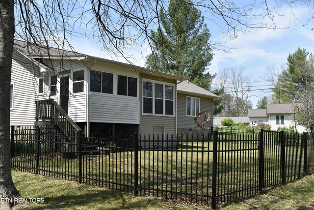 332 Yonside Dr, Sparta, TN 38583 - back of property with a lawn and a fenced front yard