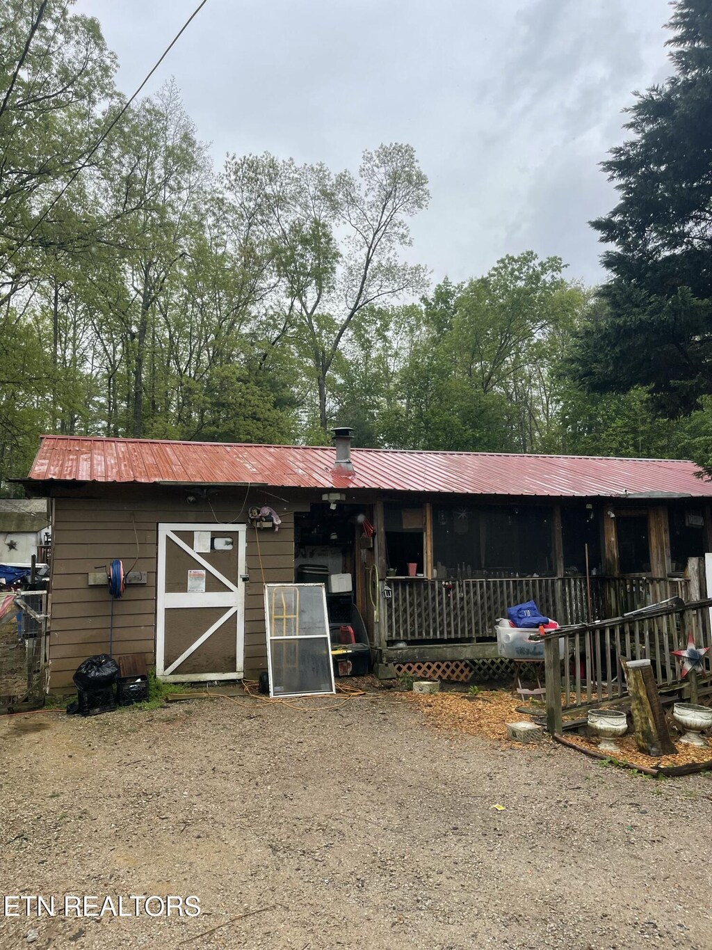 exterior space with metal roof