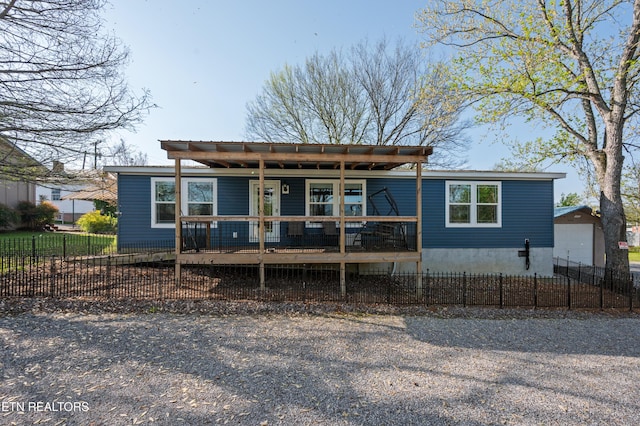 648 Old Douglas Dam Rd, Sevierville, TN 37876 - exterior space featuring a fenced front yard and covered porch