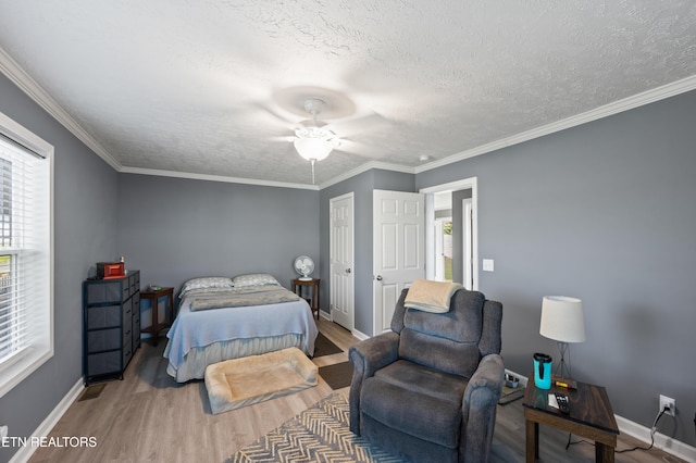 648 Old Douglas Dam Rd, Sevierville, TN 37876 - bedroom with wood finished floors, baseboards, and multiple windows