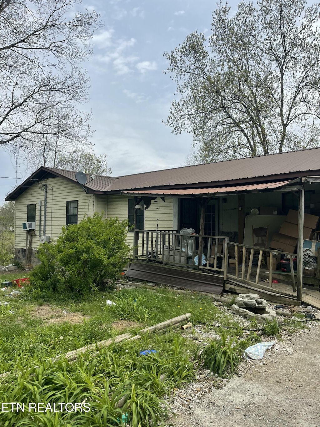 1316 Ditney Trl, Pioneer, TN 37847 - rear view of house featuring metal roof and covered porch