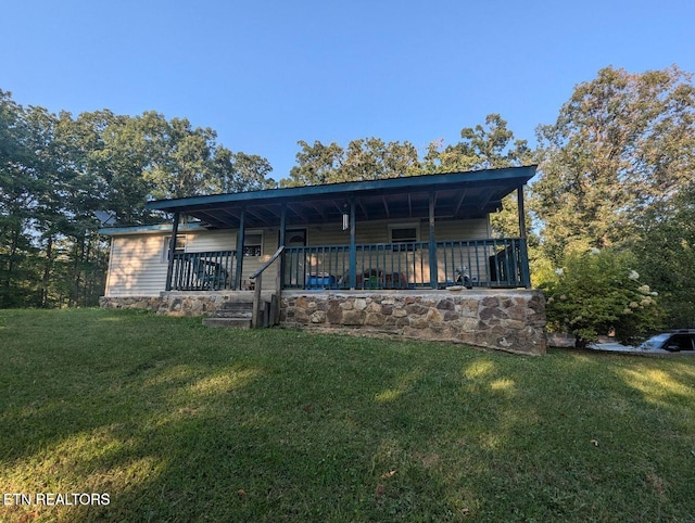 430 Buell Ln, Speedwell, TN 37870 - rear view of property with a yard