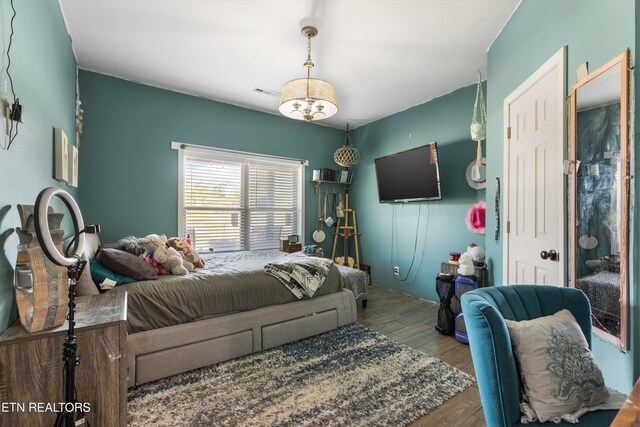 1842 Chapel Rd, Sevierville, TN 37876 - bedroom featuring visible vents and wood finished floors