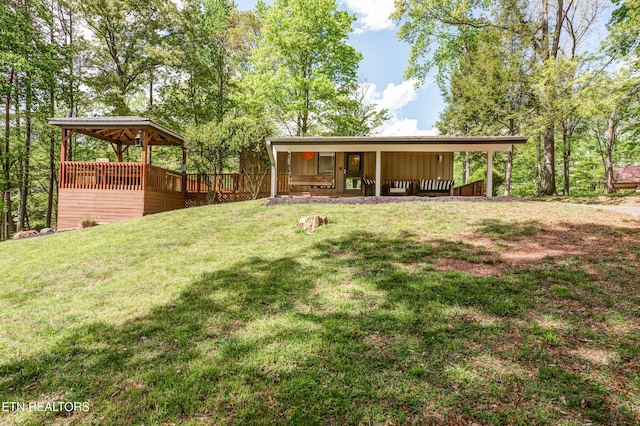 view of yard featuring a deck