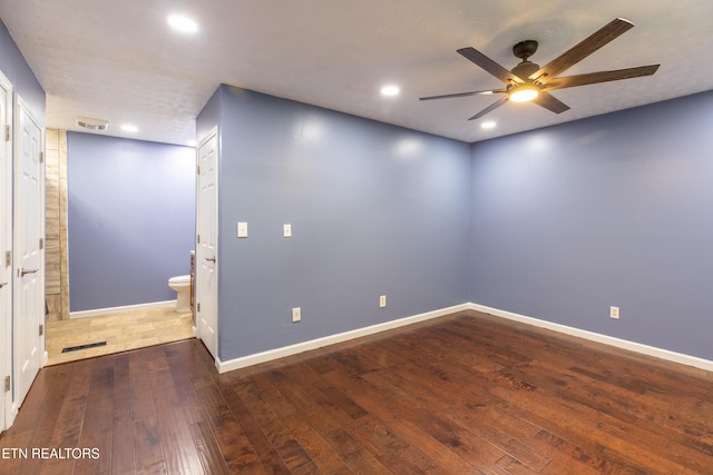 spare room featuring ceiling fan, recessed lighting, baseboards, and wood-type flooring
