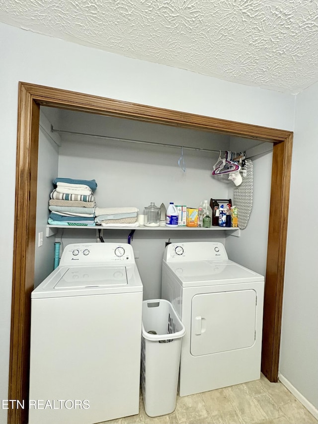 laundry room featuring laundry area and separate washer and dryer