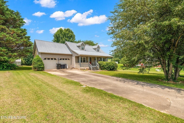 12903 Georgetown Village Ln, Georgetown, TN 37336 - cape cod-style house featuring a garage, a porch, concrete driveway, and a front lawn